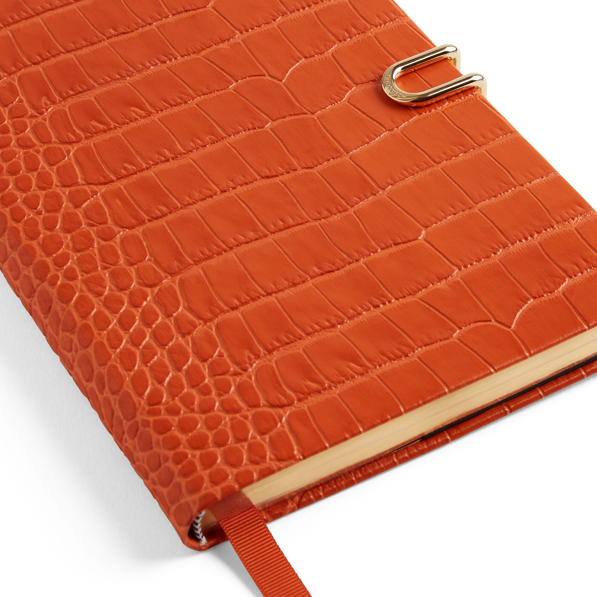 Soho Notebook with Slide Closure in Mara in orange | Smythson